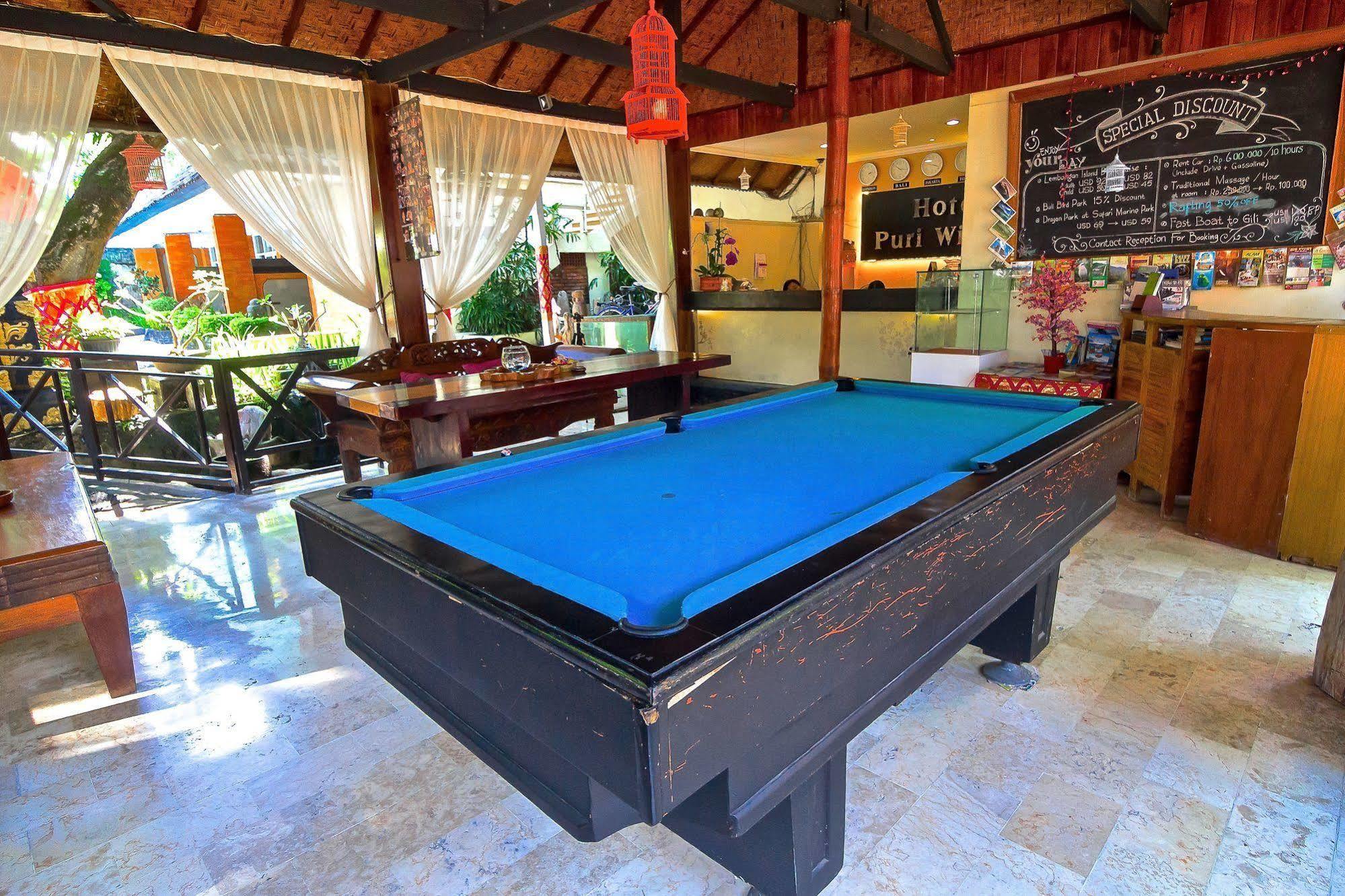 Puri Wisata Balinese Style Hotel เซมินยัค ภายนอก รูปภาพ